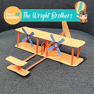 Paper adventure wright brothers plane model. Fun print-at-home activity for curious children. View of paper model on chair